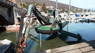 FOTO Nastavljeni radovi na produbljivanju podmorja u lučici Ičići, najavljen i veliki projekt na rivi u Mošćeničkoj Dragi